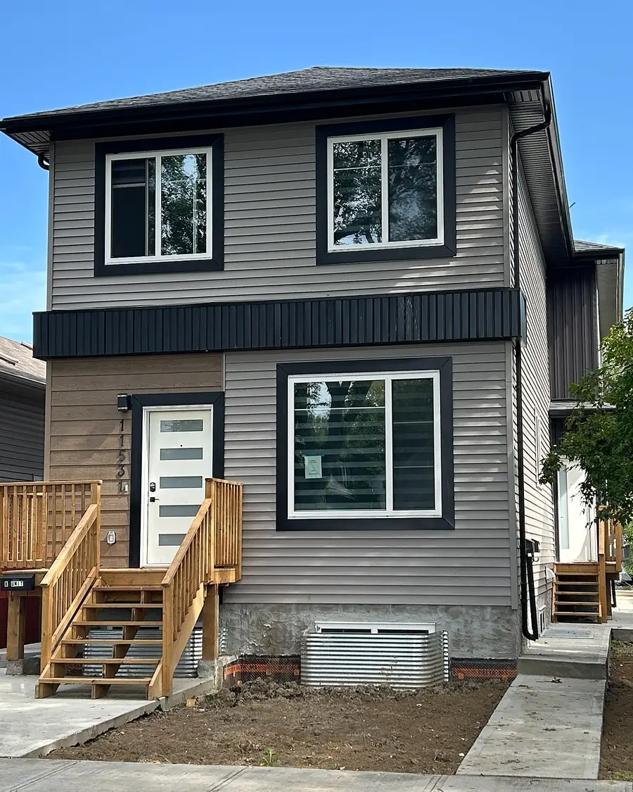 Newly finished rental unit exterior with front entry